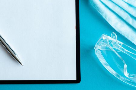 Stethoscope on light background. Doctor tool. Healthcare concept. Closeup. Empty place for text.