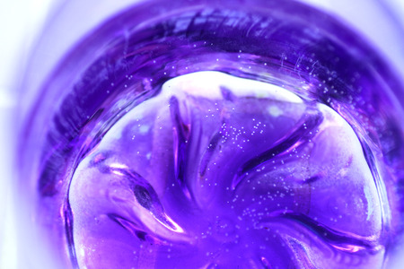Abstract violet background with white dotsの写真素材