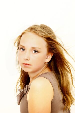 Young cute beauty girl portrait with brown hairsの写真素材