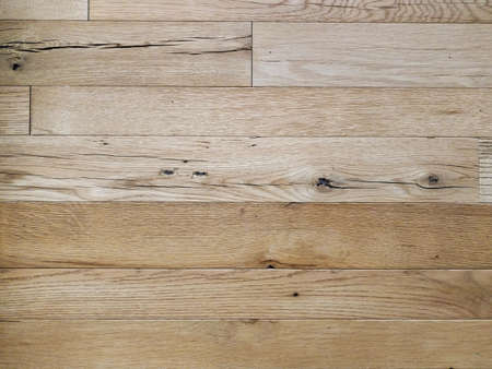 a light smooth natural wood wall panel background