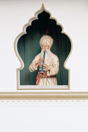 Figurine depicting Persian snake charmerの写真素材