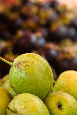 snow pears with mangosteen fruit in the backgroundの写真素材