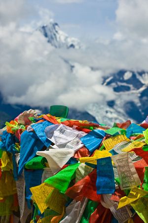 Tibetan prayer flags with meili snow mountain in backgroundのeditorial素材