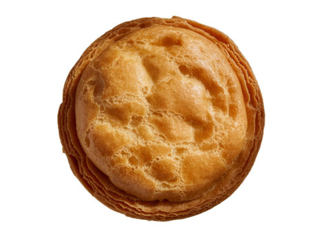 A delectable golden-brown cream puff, showcasing its flaky puff pastry and creamy filling. This high-resolution, close-up image is perfect for menus, websites, and food blogs. The transparent PNG file, set against a white background, offers versatile usage for various design projects.の写真素材