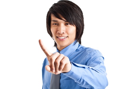 Portrait of a smiling businessman using his finger  Isolated on whiteの写真素材