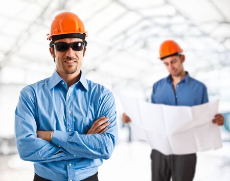 Portrait of two architects working togetherの写真素材