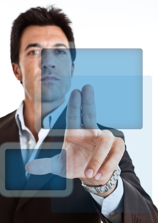 Man pushing buttons on a touch screen interfaceの写真素材