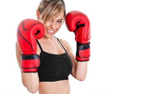 Young beautiful female boxer portraitの写真素材