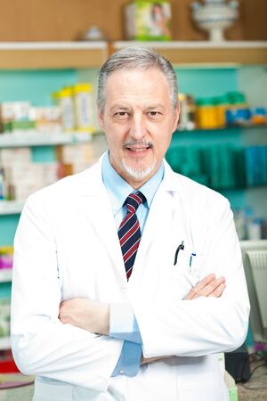 Portrait of a pharmacist in his shopの写真素材
