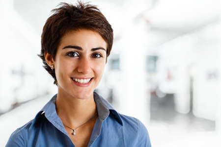 Portrait of a young smiling businesswomanの写真素材