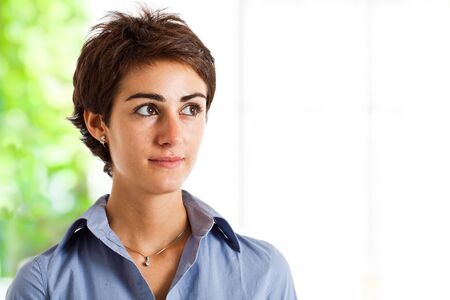 Portrait of a young smiling businesswomanの写真素材