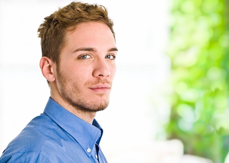 Portrait of a smiling business man isolated on whiteの写真素材