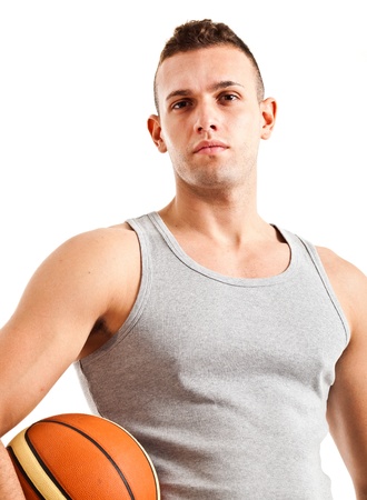 Young athlete holding a basketballの写真素材