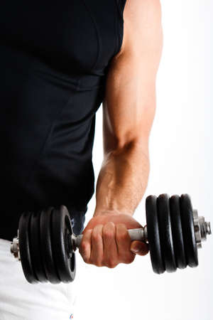 Fitness man showing his musclesの写真素材