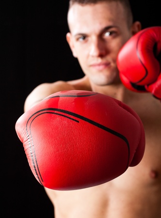 Portrait of a boxer against a dark backgroundの写真素材