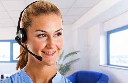 Portrait of a beautiful customer service representativeの写真素材