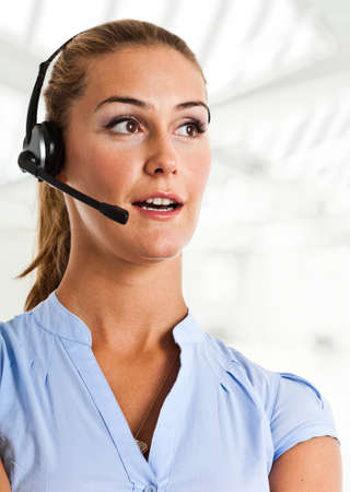 Portrait of a woman using an headsetの写真素材