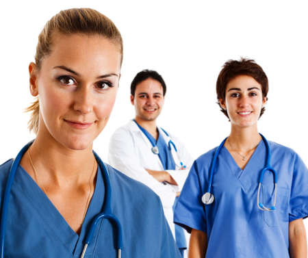 Portrait of a friendly nurse in front of her teamの写真素材