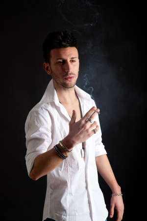 Fashion portrait of an handsome young manの写真素材