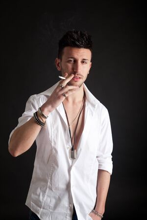 Fashion portrait of an handsome young manの写真素材