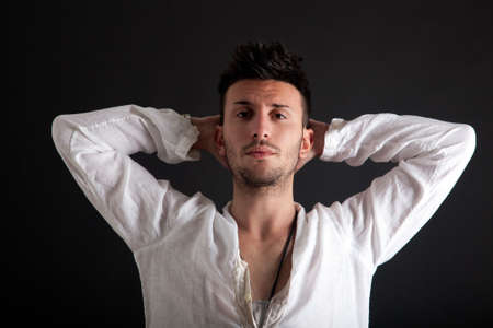 Fashion portrait of an handsome young manの写真素材