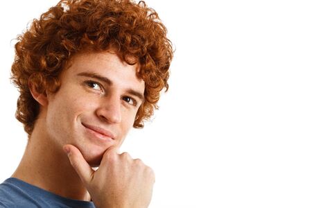 Portrait of a young man isolated on whiteの写真素材
