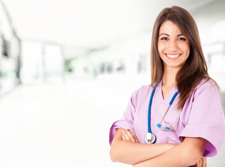 Young nurse smiling in an hospitalの写真素材