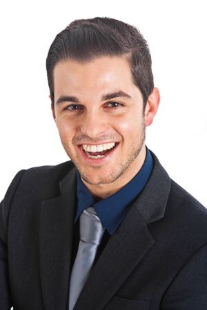 Portrait of a young happy businessman isolated on whiteの写真素材