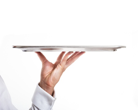Professional waiter holding an empty dish  Isolated on whiteの写真素材
