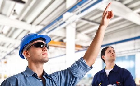 Smiling engineers at workの写真素材