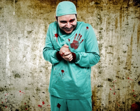 Crazy surgeon waiting for a new patientの写真素材