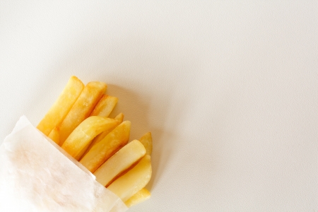 French fries in a paper bagの写真素材