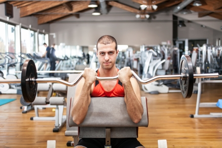 Man working out in a gymの写真素材