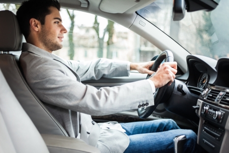 Man driving his car
