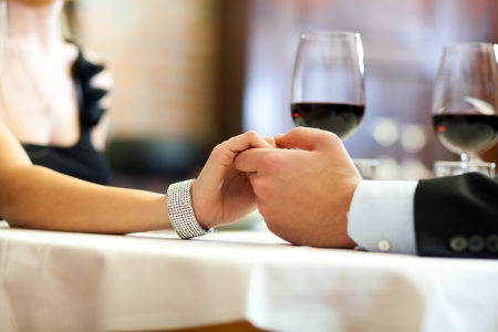 Couple having dinner in a restaurantの写真素材