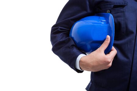 Worker holding his helmet