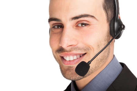 Portrait of a smiling customer representative. Isolated on whiteの写真素材