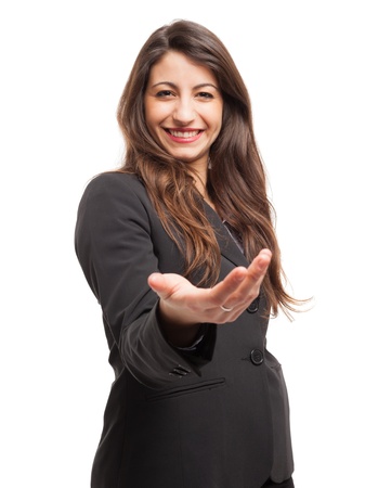 Woman showing her open palm. Isolated on whiteの写真素材