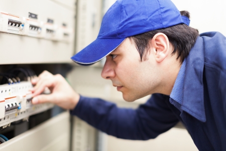 Portrait of an electrician at work