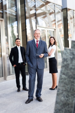 Leader in front of his teamの写真素材