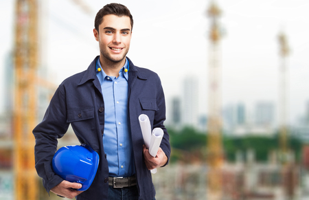 Portrait of an architect in front of a construction siteの写真素材