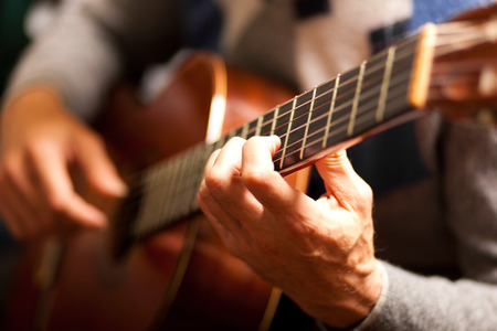 Man playing guitarの写真素材