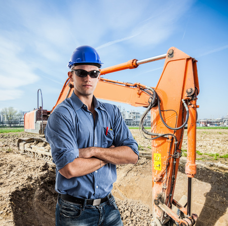Man at work in a construction siteの写真素材