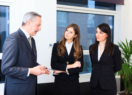 Business people at work in their officeの写真素材