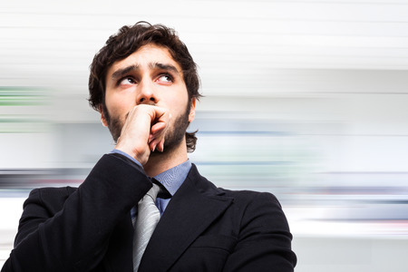 Portrait of a pensive businessmanの写真素材