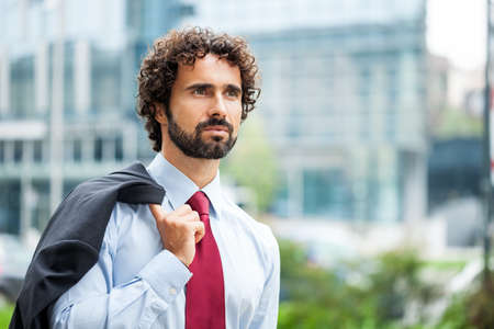 Portrait of an handsome businessman in an urban environmentの写真素材