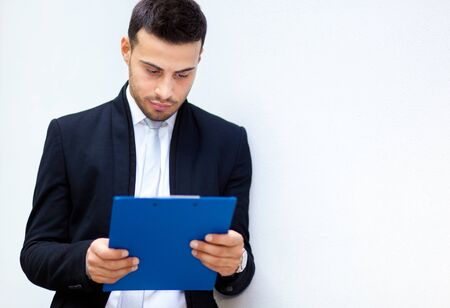 Businessman reading some documentsの写真素材