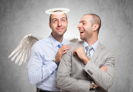 Happy man looking at his good selfの写真素材