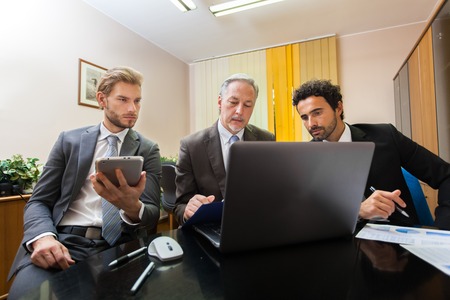 Business people at work in their office