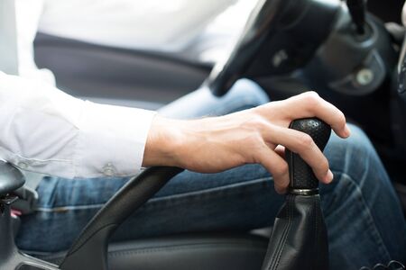 Detail of a man in his car